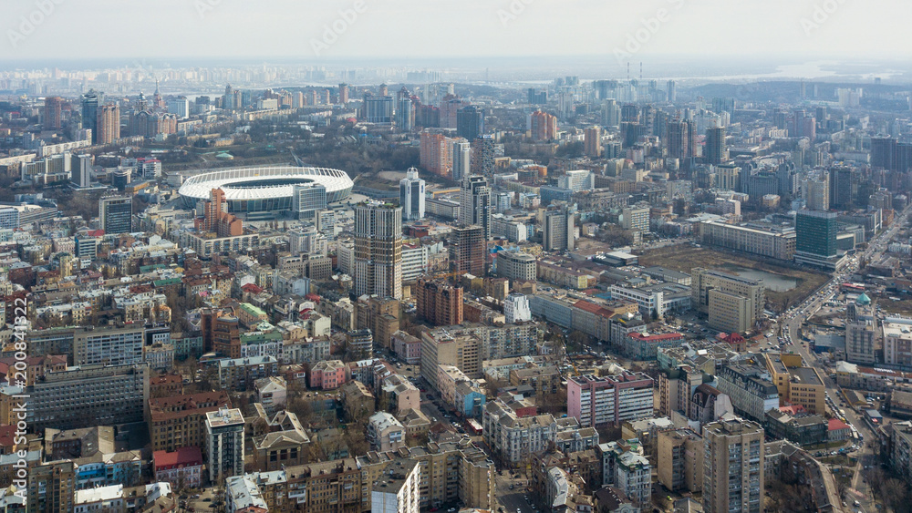 Kiev, Ukraine - April 7, 2018: Aerial photo of the Olympic Stadium in the city of Kiev on a cloudy day