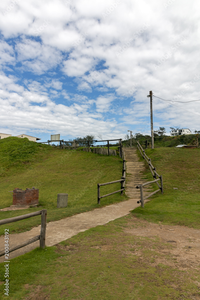 Empty Stepped Walkway at Entrance to Beach