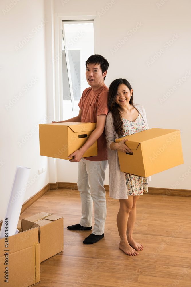 Couple moving to new house Couple moving to new house