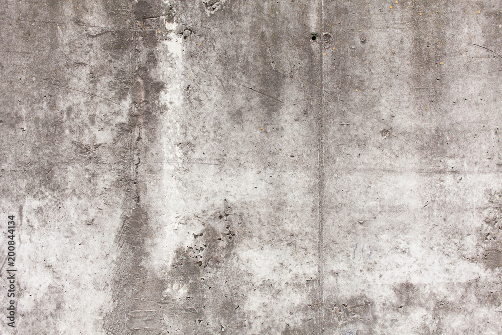 Old concrete wall with chips, cracks and holes. Old concrete wall with chips, cracks and holes.