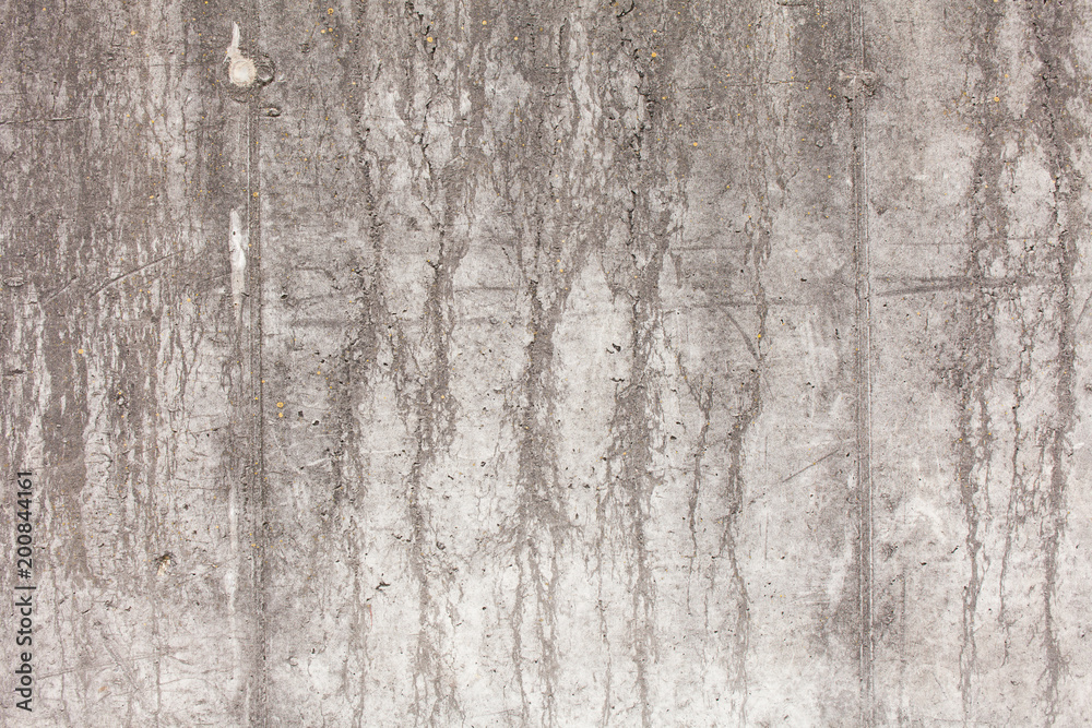 Old concrete wall with chips, cracks and holes. Background. Old concrete wall with chips, cracks and holes. Background.