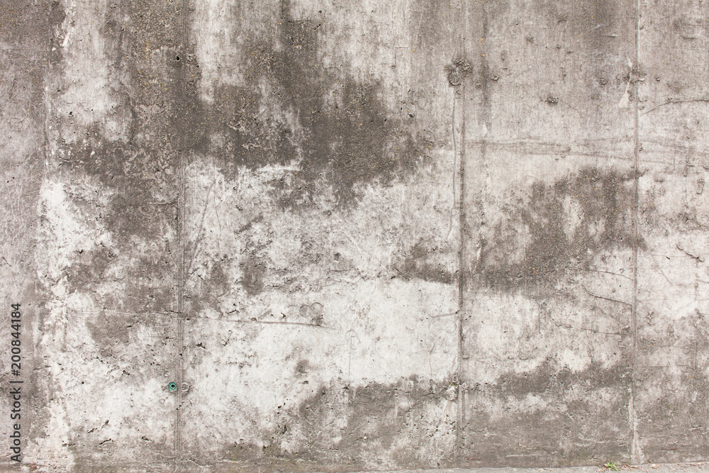 Old concrete wall with divorces, chips, cracks and holes. Old concrete wall with divorces, chips, cracks and holes.