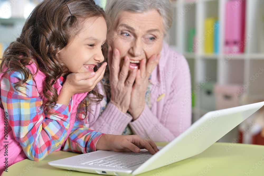 portrait of happy grandmother and daughter 
