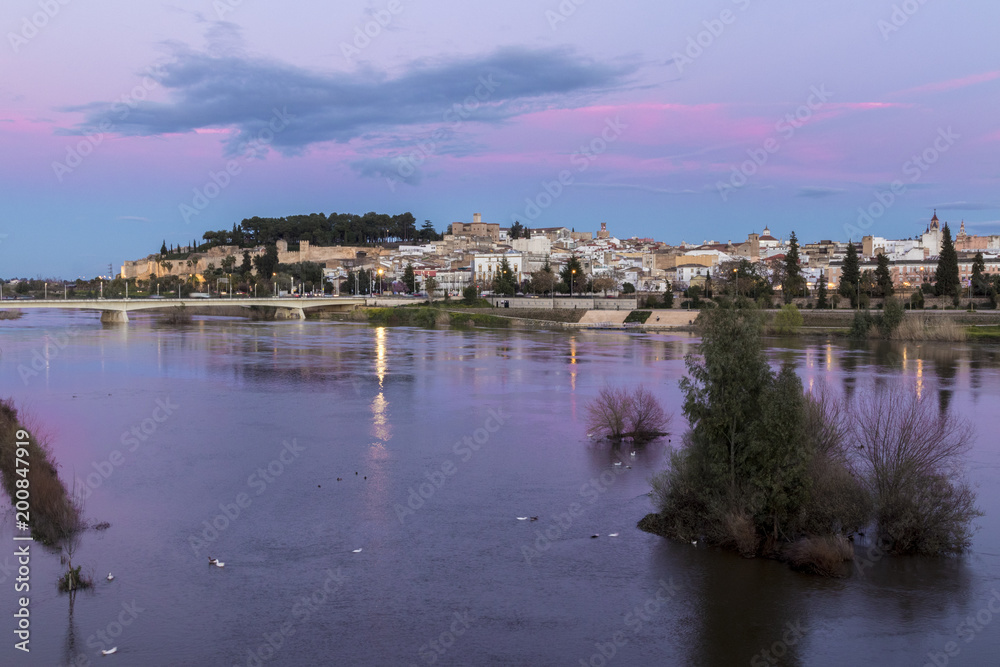 Badajoz, Spain. Views at sunset of river Guadiana and the Old Town, from the Puente de Palmas bridge