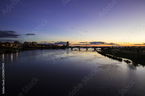 Badajoz, Spain. Views at sunset of river Guadiana and the Puente Real (Royal Bridge), from the Puente de Palmas bridge