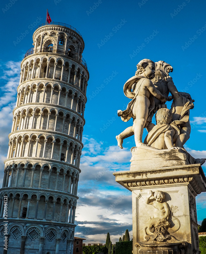 The Leaning Pisa tower in the blue sky
