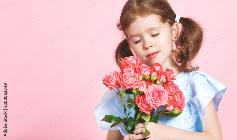 funny child girl with bouquet of flowers on colored background funny child girl with bouquet of flowers on colored background