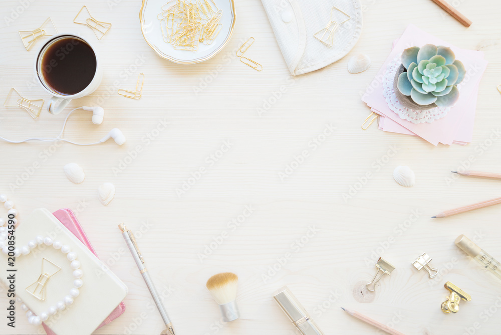 Female working space in pastel tones Female working space in pastel tones