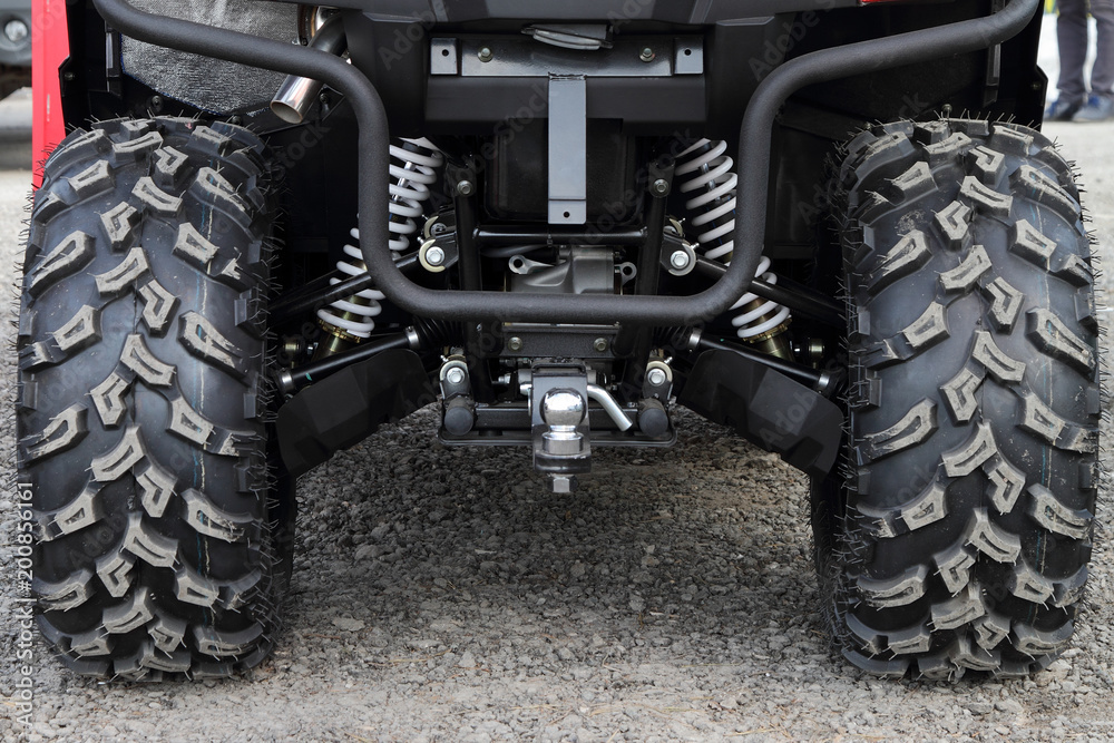 Naklejka premium Rear wheels and a coupling of the ATV.