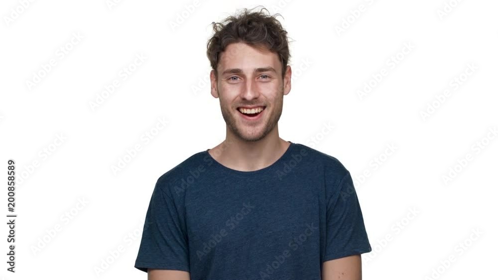 Portrait of happy handsome guy having bristle looking on camera with wide smile, isolated over white background in studio closeup. Concept of emotions Portrait of happy handsome guy having bristle looking on camera with wide smile, isolated over white background in studio closeup. Concept of emotions