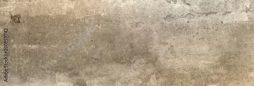 Panel kuchenny z motywem Textur einer XXL Betonwand, auf die etwas Sonnenlicht fällt als Hintergrund