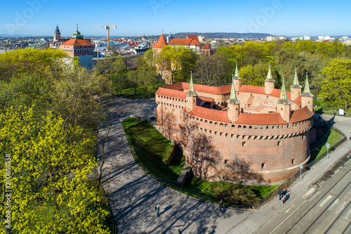 Barbican (Barbakan) in Cracow, Poland. The best preserved medieval barbican in Europe and Planty park surrounding the old city. Aerial view