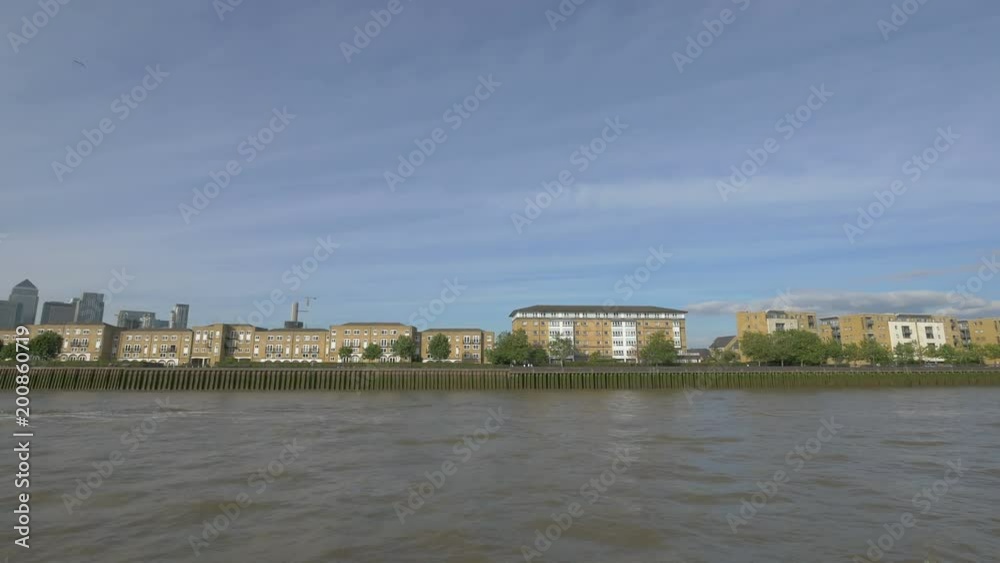 Buildings on the waterfront of River Thames Buildings on the waterfront of River Thames