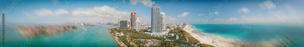 Panoramic aerial view of Miami Beach and South Pointe Park at dusk