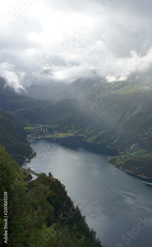 Top view of the Geiranger fjord from the observation deck, sunrise, overcast, Norway
