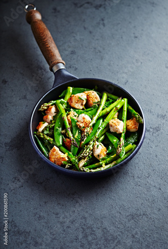 Sesame Chicken with Green asparagus and Sugar Snap Peas flavoured with lemon peel  (stir fry)