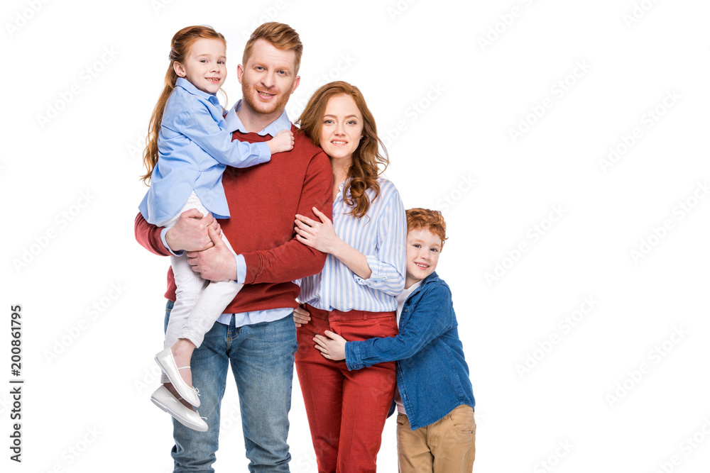 beautiful happy redhead family with two children smiling at camera isolated on white beautiful happy redhead family with two children smiling at camera isolated on white