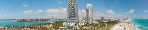 Aerial panoramic sunset view of South Beach with park and buildings and beach - Miami, Florida © jovannig