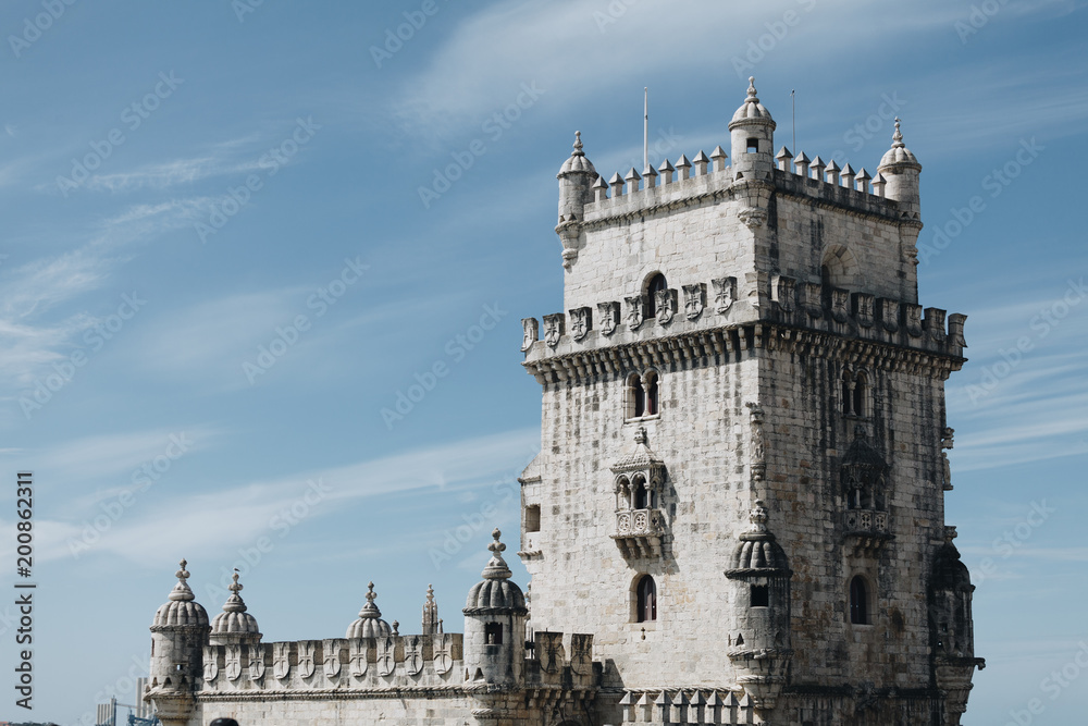 The Belem Tower - Old defense tower on the Tagus River - Lisbon Portugal - tourism attraction.