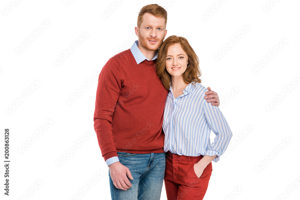 portrait of happy redhead couple standing together and smiling at camera isolated on white portrait of happy redhead couple standing together and smiling at camera isolated on white