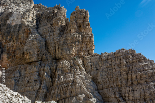 Via ferrata route carved into rock.