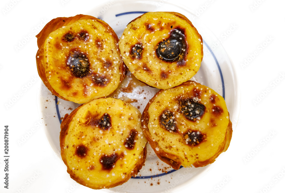 Top view of plate with pasteis de nata