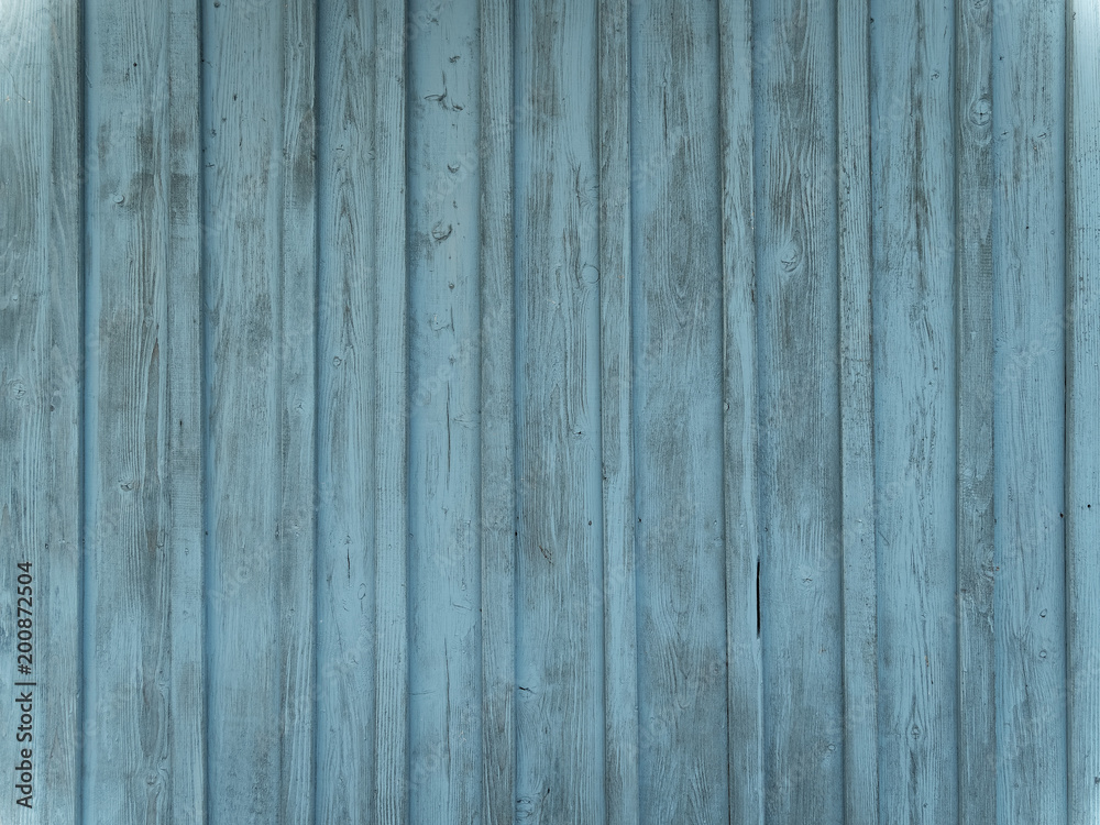 Barn wood wall with distressed, peeling blue paint Barn wood wall with distressed, peeling blue paint