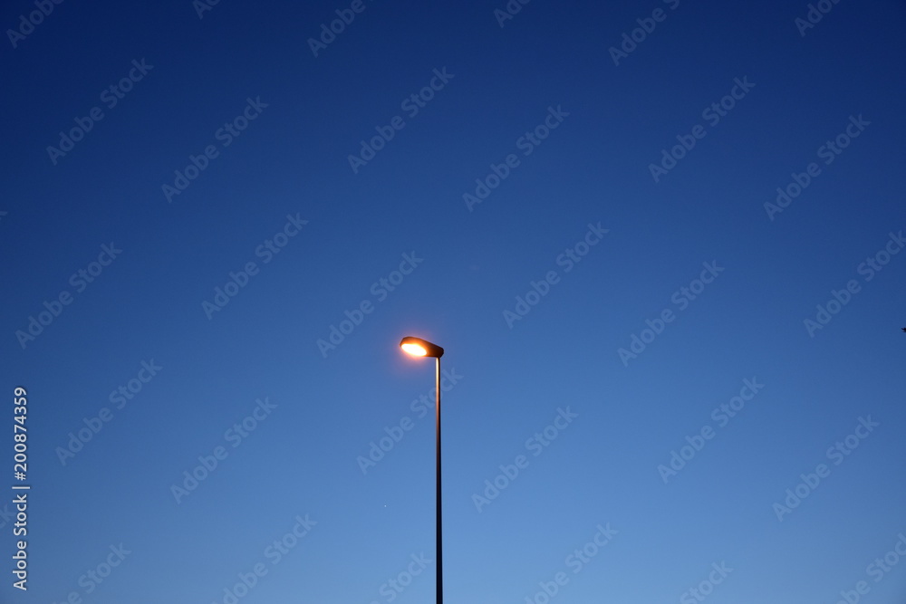 Light of a modern street lamp. Light of a modern street lamp.