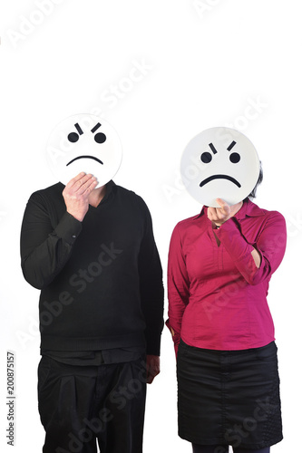 couple with a plate in their face who are angry photo