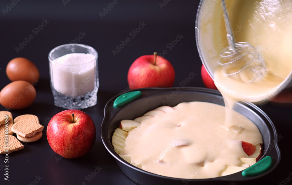 Preparation of apple pie at home. Homemade pastries with apples Preparation of apple pie at home. Homemade pastries with apples