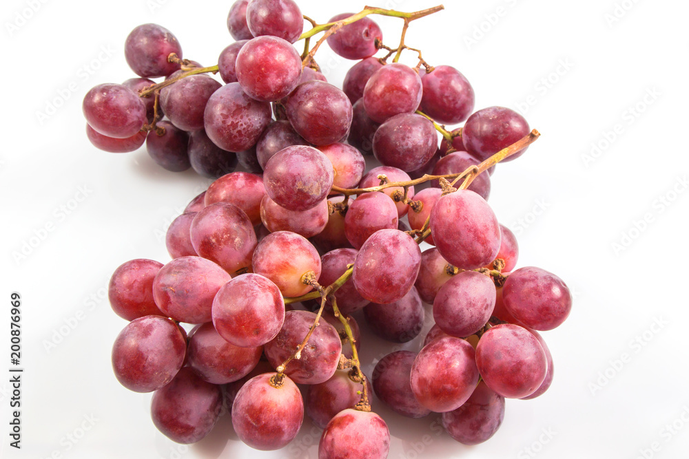 Red grape bunch, wine grapes isolated on white background, healthy fruit, Food concept. Red grape bunch, wine grapes isolated on white background, healthy fruit, Food concept.