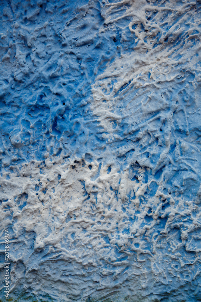 Blue and white decorative plaster on the wall like a sky. Art background
