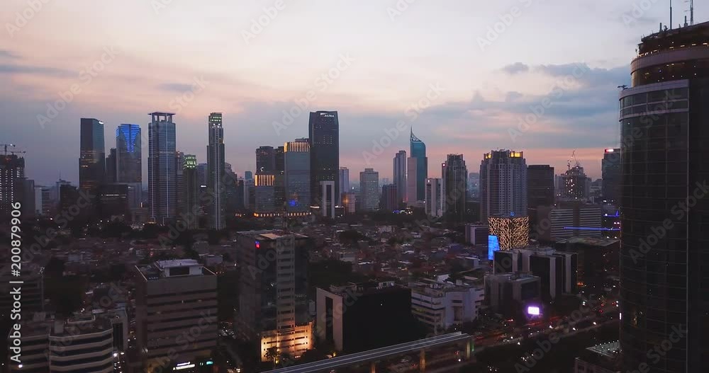 JAKARTA - Indonesia. April 11, 2018: Panoramic view of skyscrapers with beautiful night light in Jakarta capital city. Shot in 4k resolution JAKARTA - Indonesia. April 11, 2018: Panoramic view of skyscrapers with beautiful night light in Jakarta capital city. Shot in 4k resolution