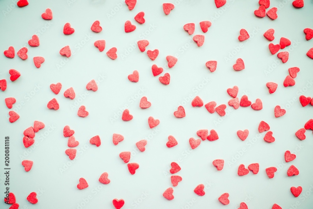 Light background with red hearts. Light background with red hearts.