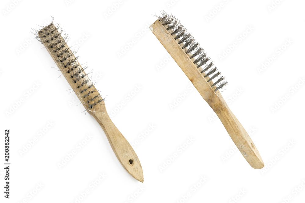 old and rusty wire brush from two sides, isolated on white old and rusty wire brush from two sides, isolated on white