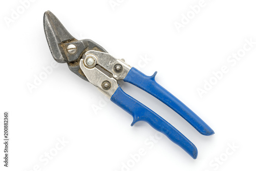 old blue tin snips, isolated on white
