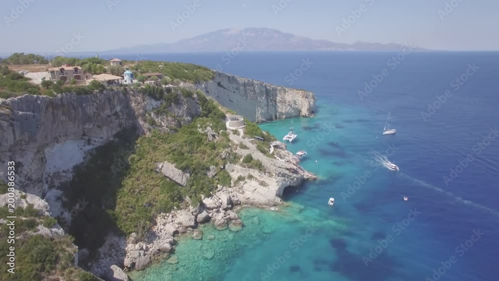 4K (UHD) Aerial view of Agios Nikolaos blue caves in Zakynthos (Zante) island, in Greece - Log 4K (UHD) Aerial view of Agios Nikolaos blue caves in Zakynthos (Zante) island, in Greece - Log