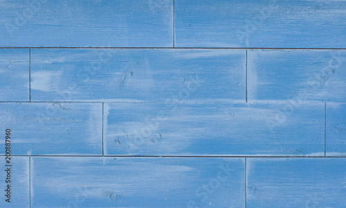 Wooden textured background, painted blue, old weathered natural wood. Floor or wall. Flat lay. Closeup.