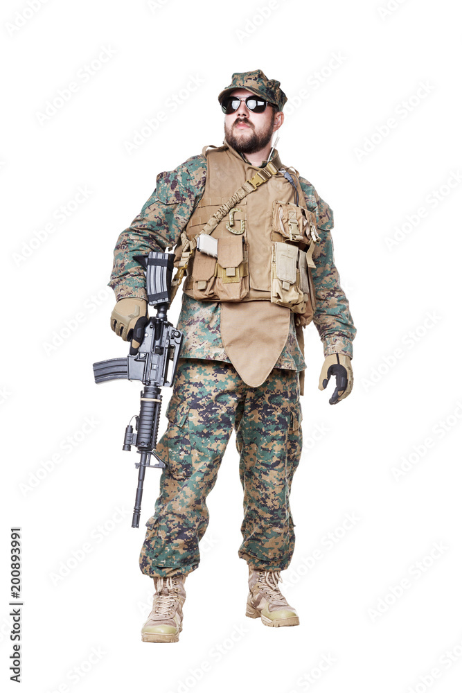 Studio shot of United States Marine with rifle weapons in uniforms. Military equipment, army helmet, combat boots, tactical gloves. Isolated on white, weapons, army, patriotism concept