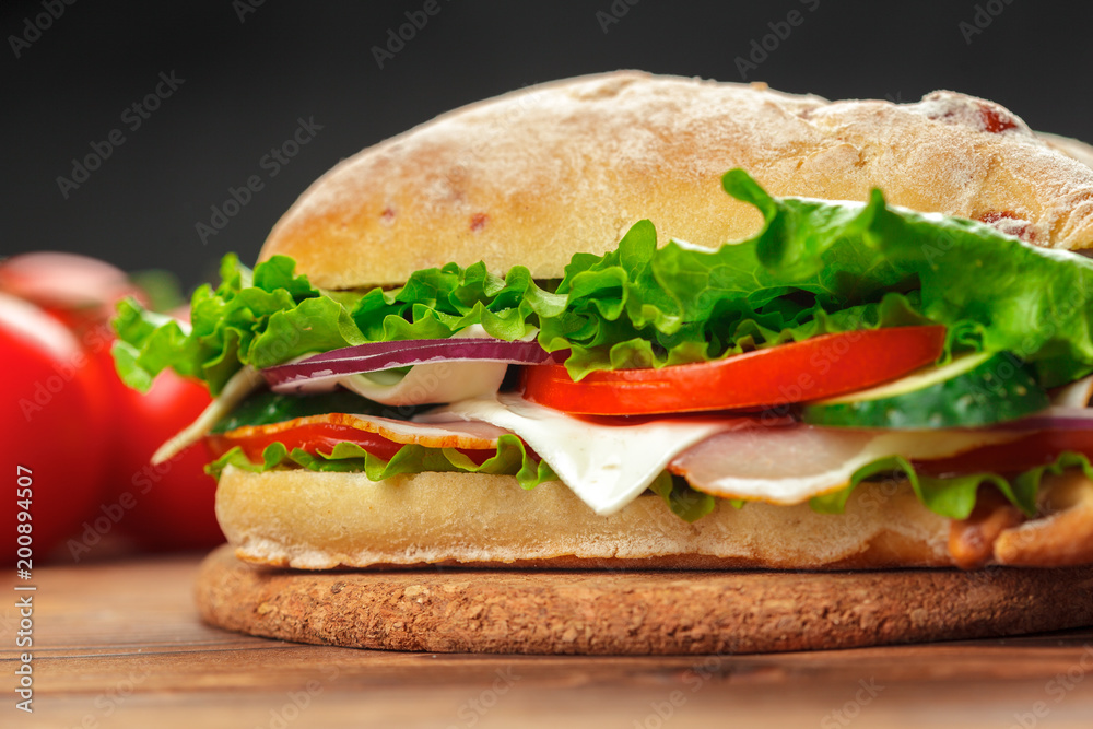 sandwich on a wooden table sandwich on a wooden table