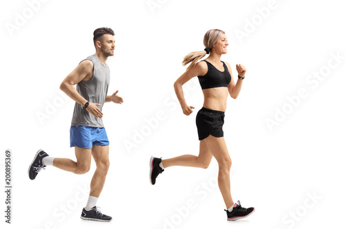 Young man and a young woman running