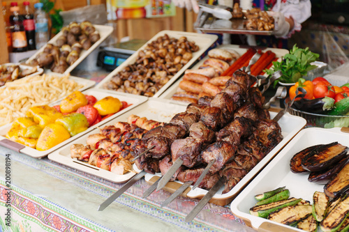 Shish kebab. Grilled kebab on metal skewer. Street food.