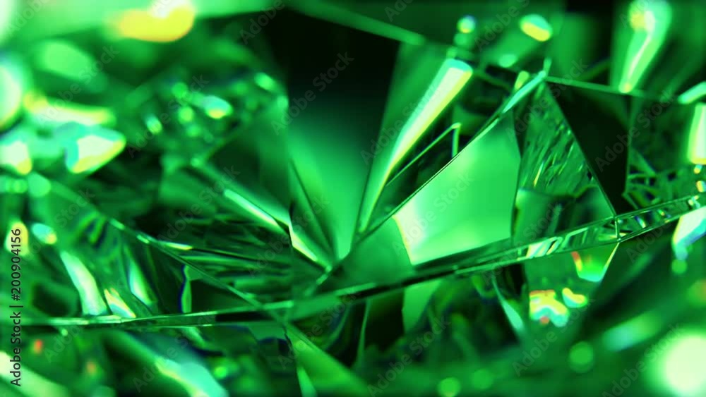 Close-up of slow rotate green diamond. Loopable, beautiful background