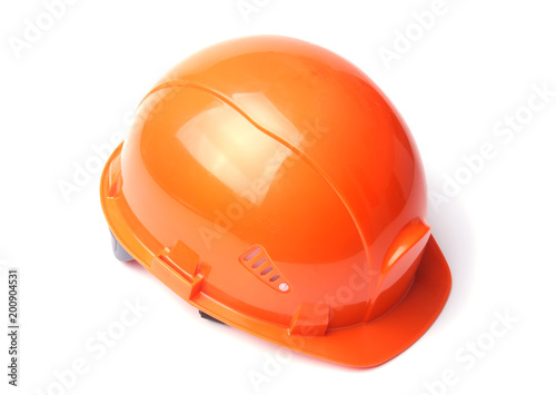 Orange hard hat isolated on white background. Safety helmet.