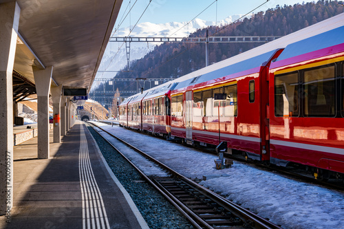 Swiss red train parking at the station