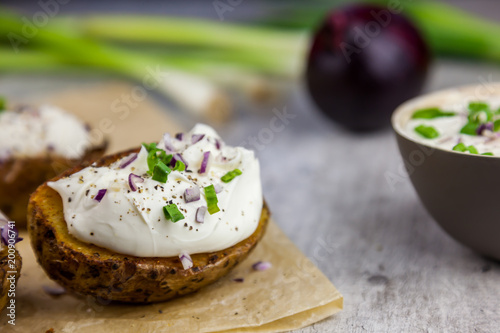 Baked jacket potatoes stuffed with curd and spring onion