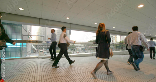 People walking in pedestrian bridge