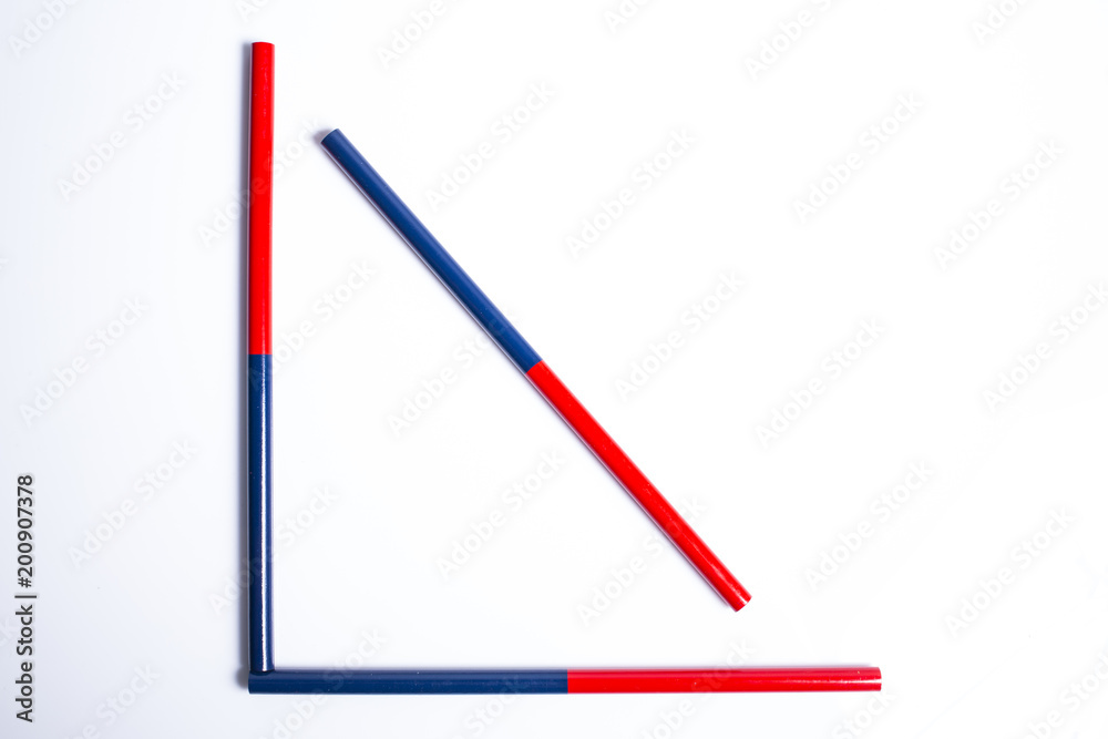 Two colored pencils, two sided, Red and blue pencils Isolated on white background Two colored pencils, two sided, Red and blue pencils Isolated on white background
