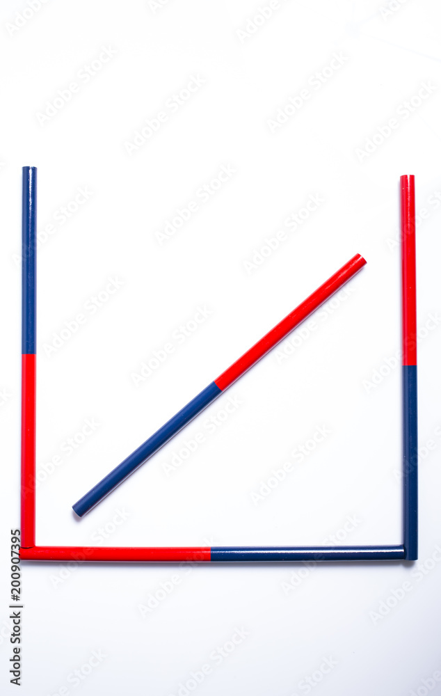 Two colored pencils, two sided, Red and blue pencils Isolated on white background Two colored pencils, two sided, Red and blue pencils Isolated on white background
