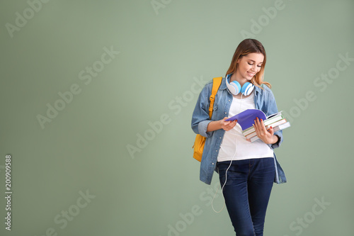 Pretty student with noteboo...